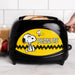Toaster with Snoopy and Woodstock design on a yellow background, featuring the Peanuts logo.