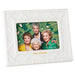 White quilted photo album with 'The Golden Girls' cover featuring four women.