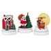 Set of three Christmas-themed figurines including a house, Santa Claus, and a sleigh with reindeer on a white background.