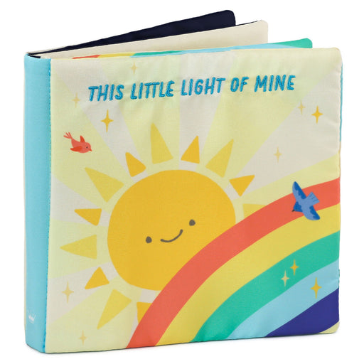 Children's book with a sun and rainbow illustration on a white background