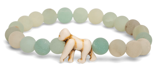 Beaded bracelet with a small elephant figure on a white background