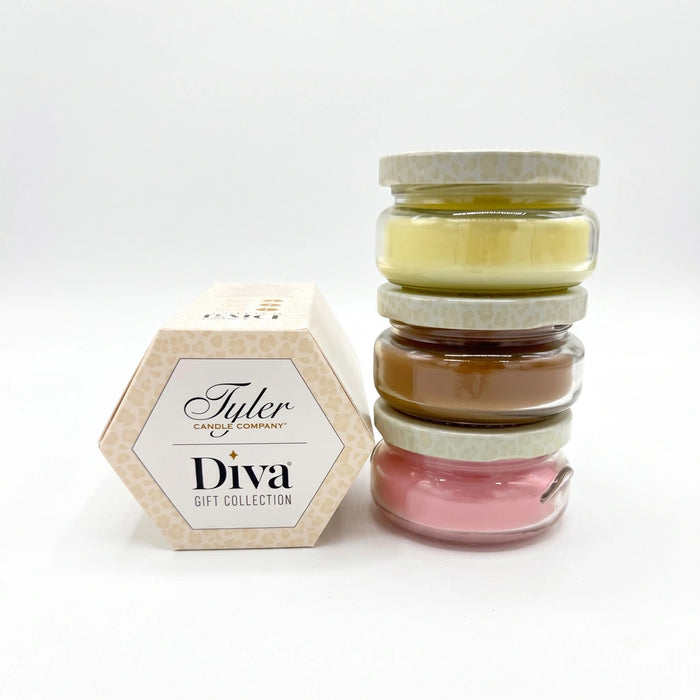 Tyler Cheaper Than Therapy Gift Collection Candle in a clear glass jar with the Cheaper Than Therapy label displayed on a white background.