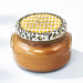 Tyler Cowboy Candle Collection scented candle in a clear glass jar with a Cowboy label and metal lid displayed on a white background.