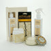 Tyler Diva Glamorous Suite VI Gift Set with a 3 oz candle, 4 oz Glamorous Wash, and Autoglam car freshener displayed in decorative packaging on a white background.
