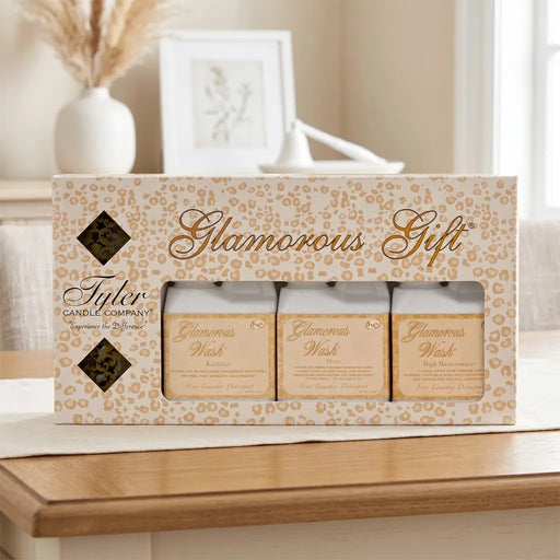 Tyler Glamorous Gift Set with coordinated fragrance products displayed in decorative gift packaging on a white background.
