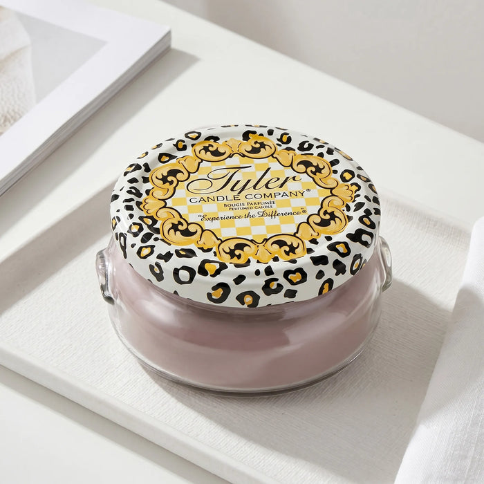Tyler High Maintenance Candle Collection scented candle in a glass jar with the High Maintenance label displayed on a white background.