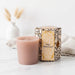 Tyler High Maintenance Candle Collection scented candle in a glass jar with the High Maintenance label displayed on a white background.
