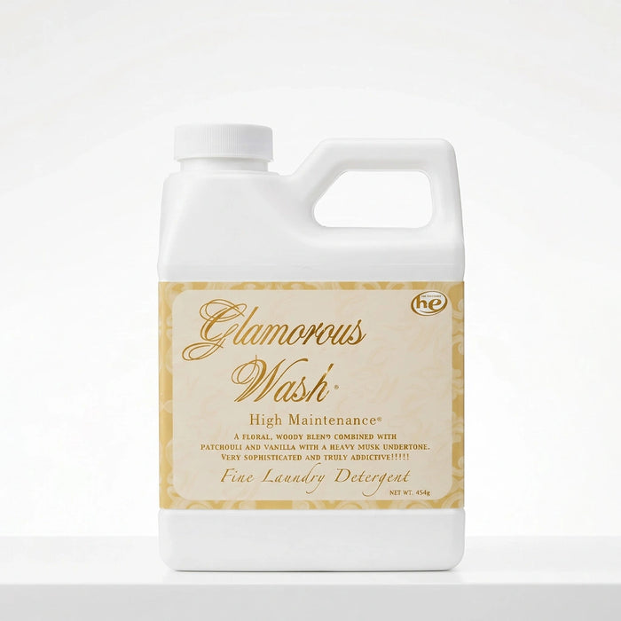 Tyler High Maintenance Glamorous Wash liquid laundry detergent bottle with the High Maintenance label displayed on a white background.