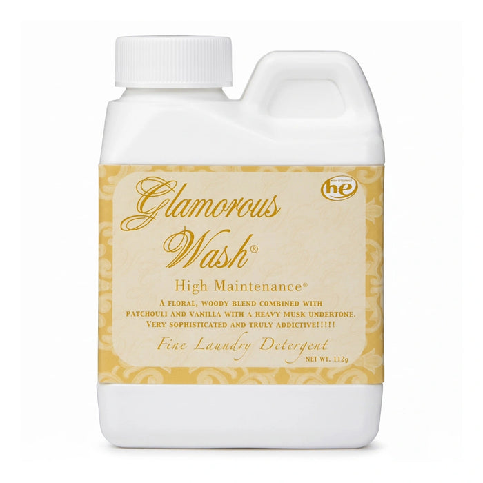 Tyler High Maintenance Glamorous Wash liquid laundry detergent bottle with the High Maintenance label displayed on a white background.