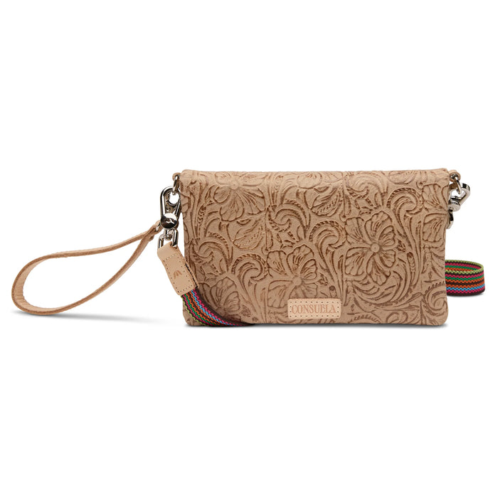 Beige patterned handbag with a strap on a white background