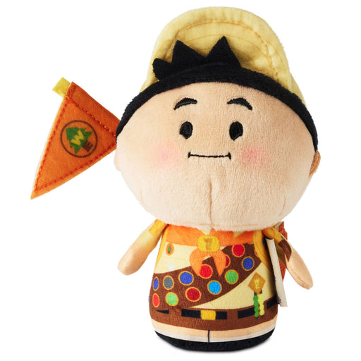 Plush toy resembling a character with a colorful outfit and hat on a white background