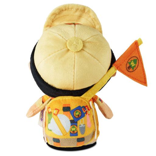 Plush toy with a yellow hat and backpack on a white background
