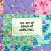 Colorful fabric patch with a motivational message on a multicolored background