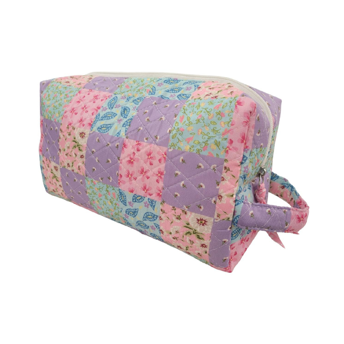 Patchwork-style bag with floral patterns on a white background