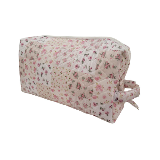 Floral-patterned fabric wedge on a white background