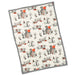 A rectangular fabric item, likely a tea towel or blanket, featuring a repeating Halloween pattern of haunted houses, pumpkins, bats, and trees on an off-white background, finished with a black and white checkered border.