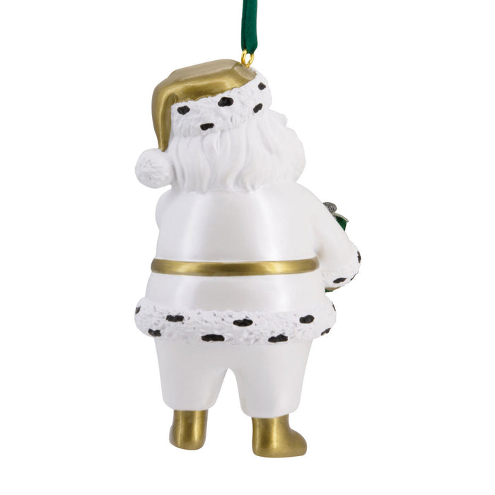 Decorative ornament of a white figure with gold accents on a white background