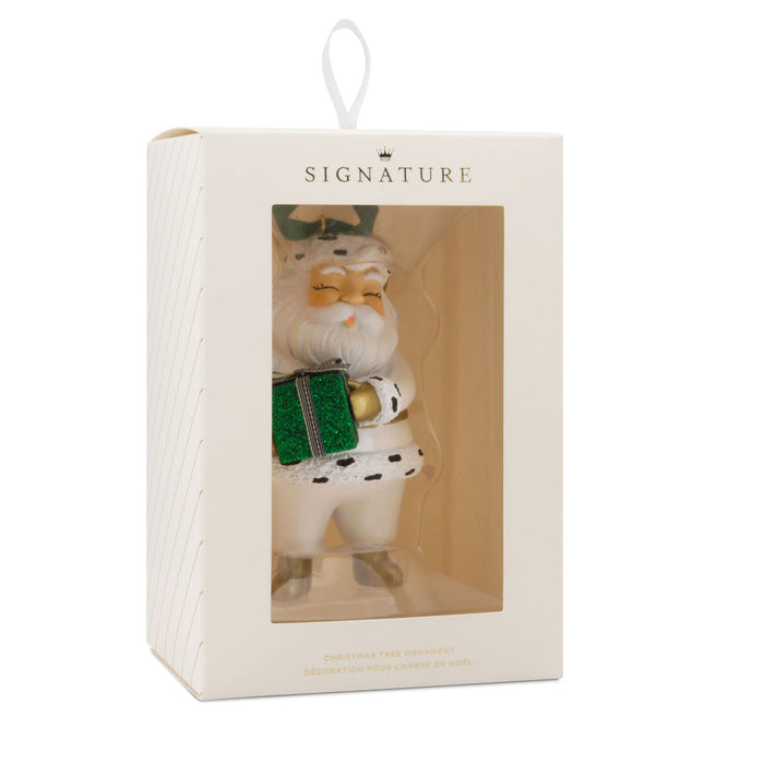 Decorative snowman ornament in a 'Signature' box on a white background