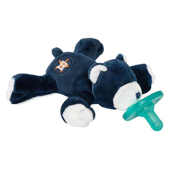 Navy blue plush toy with white accents and a green pacifier on a white background