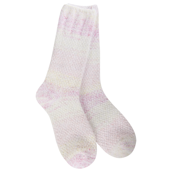 Pair of white and pink textured socks on a white background