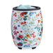 Floral-patterned wax warmer on a white background