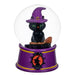 Black cat in a witch hat inside a snow globe with a purple base on a white background