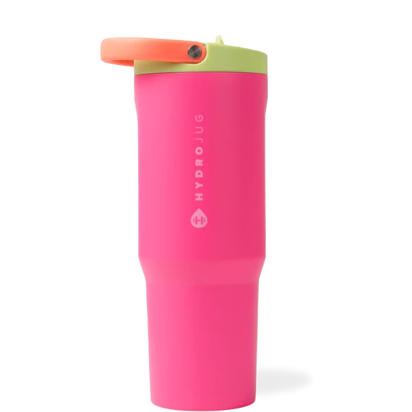 Pink tumbler with a green lid on a white background