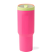 Pink tumbler with a green lid on a white background