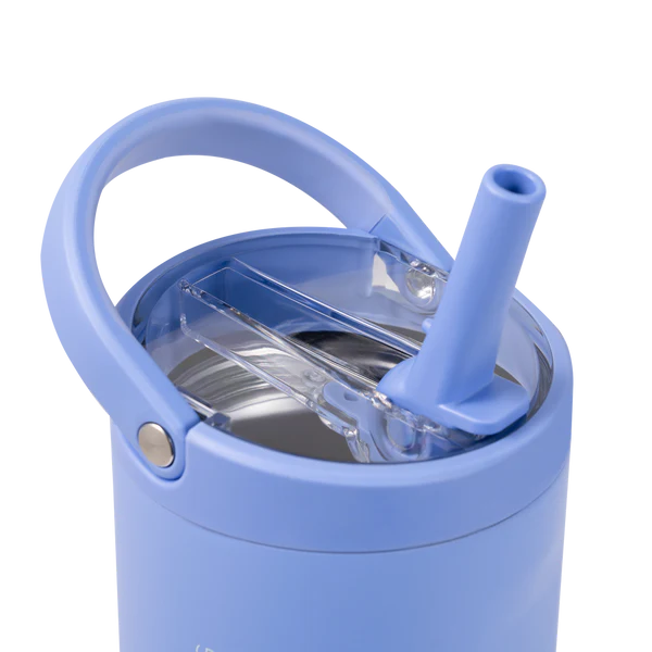 Blue tumbler with handle and straw on a white background