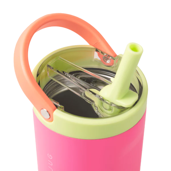 Pink and green tumbler with an orange handle and straw on a white background