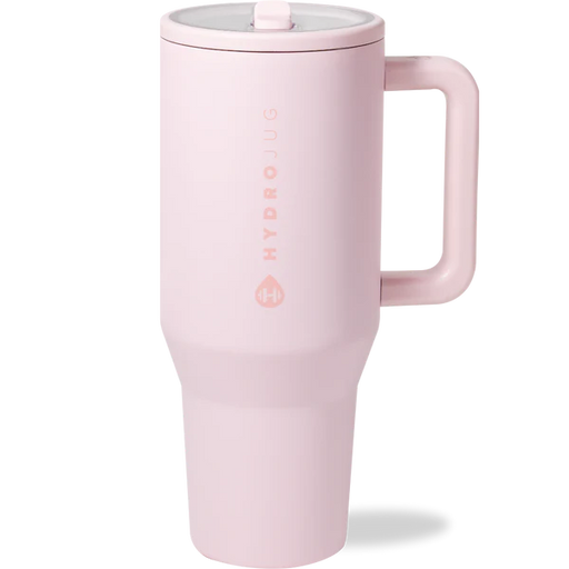 Pink travel mug with handle on a white background