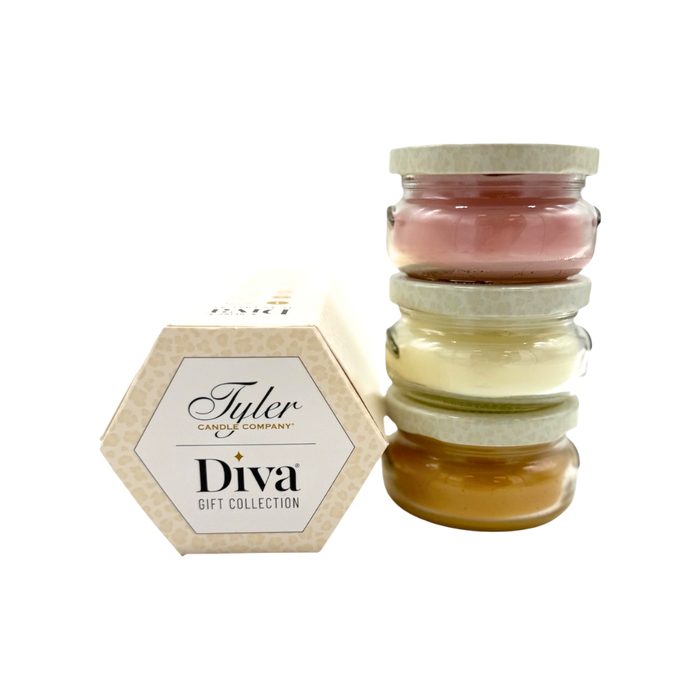Stack of small jars with colorful candles and a box labeled Tyler Candle Company Diva Gift Collection on a white background.