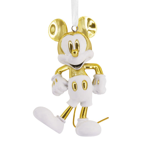 Gold and white character ornament on a white background