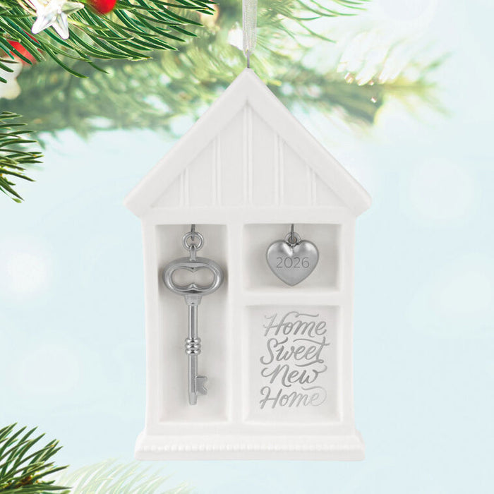 Decorative ornament with key and heart shaped tag on a Christmas tree