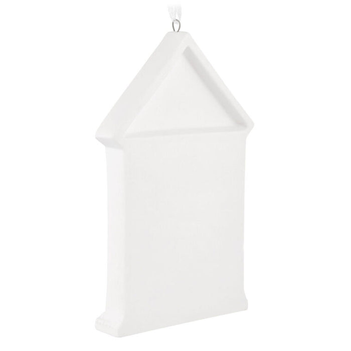 White birdhouse on a white background