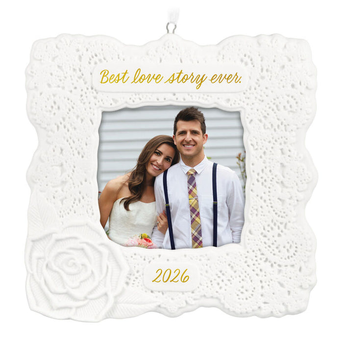 Decorative photo ornament with a couple's picture and 'Best love story ever. 2026' text.