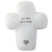 White cross-shaped plush toy with 'Let Your Light Shine' text and heart symbol on a white background