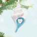 Decorative shell ornament with 'Friends in our hearts' and '2026' on a Christmas tree background