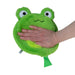 Green plush frog toy held by a hand on a white background