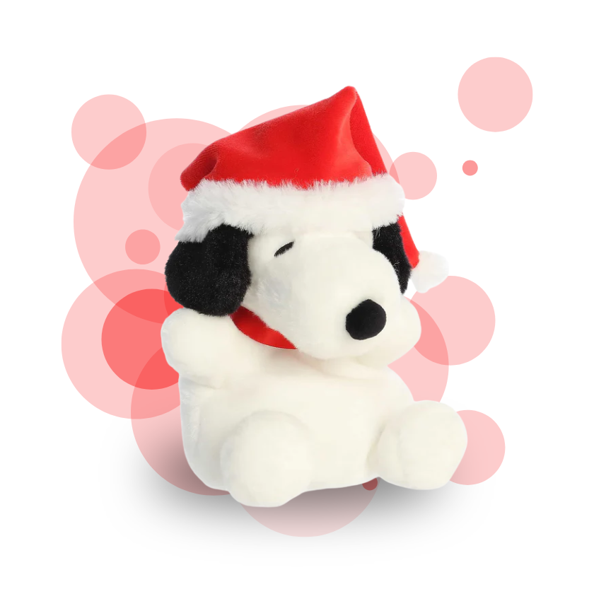 Plush toy resembling a dog wearing a Santa hat on a white background with pink circular designs.