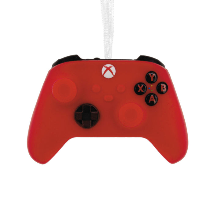 A red Xbox One controller ornament with a white hanging ribbon, shown against a plain white background.