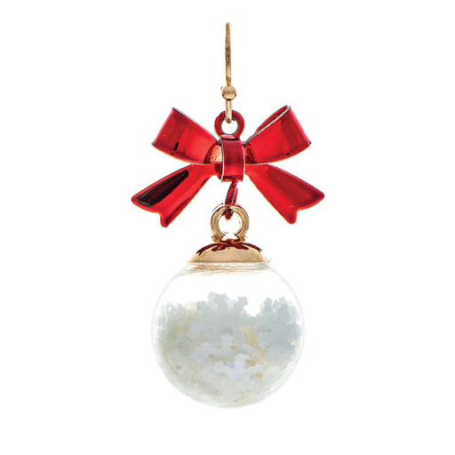 A Christmas ornament shaped like a clear glass bauble filled with white snow-like flakes, topped with a shiny red bow and gold-tone hardware, shown on a plain white background.
