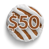 Donut with white icing and a $50 price tag on a white background