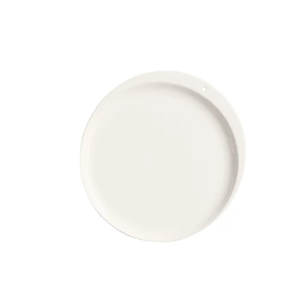 White ceramic plate on a white background