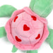 Plush toy shaped like a pink flower with red heart patterns on a white background