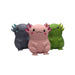 Three colorful axolotl figurines on a white background