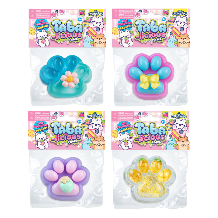 Four packaged paw-shaped gel toys arranged in a 2x2 grid on a white background. Each package has a colorful header card with cartoon graphics and the brand name 'Taba Jecious'.