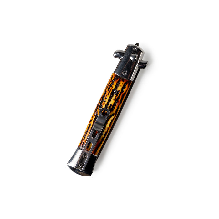 Guitar pickup with tortoiseshell casing on a white background