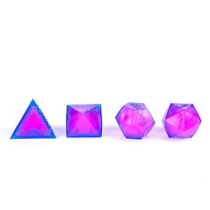 Four colorful polyhedral dice on a white background