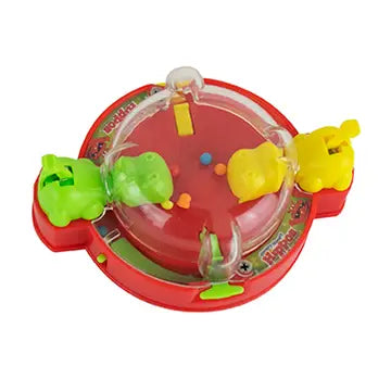 Colorful toy with red base and green and yellow figures on a white background